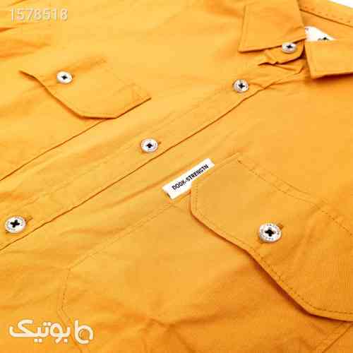 https://botick.com/product/1578518-پیراهن-آستین-کوتاه-مردانه-دوک-مدل-کتان-دو-جیب-رنگ-نارنجی